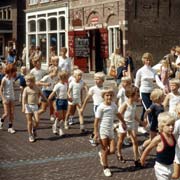 Children marching past